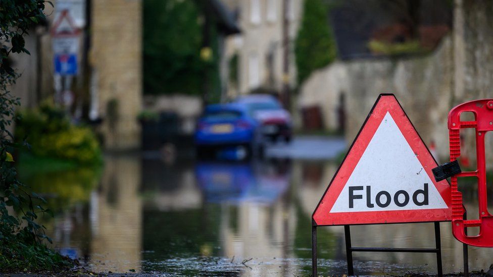 An Intelligent Flood Automation System Using IoT and Machine Learning